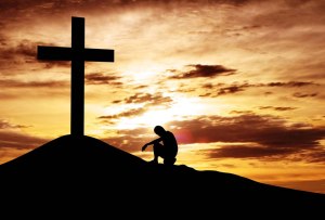 humillado ante la cruz